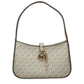 Michael Kors Handtasche aus goldenem Stoff